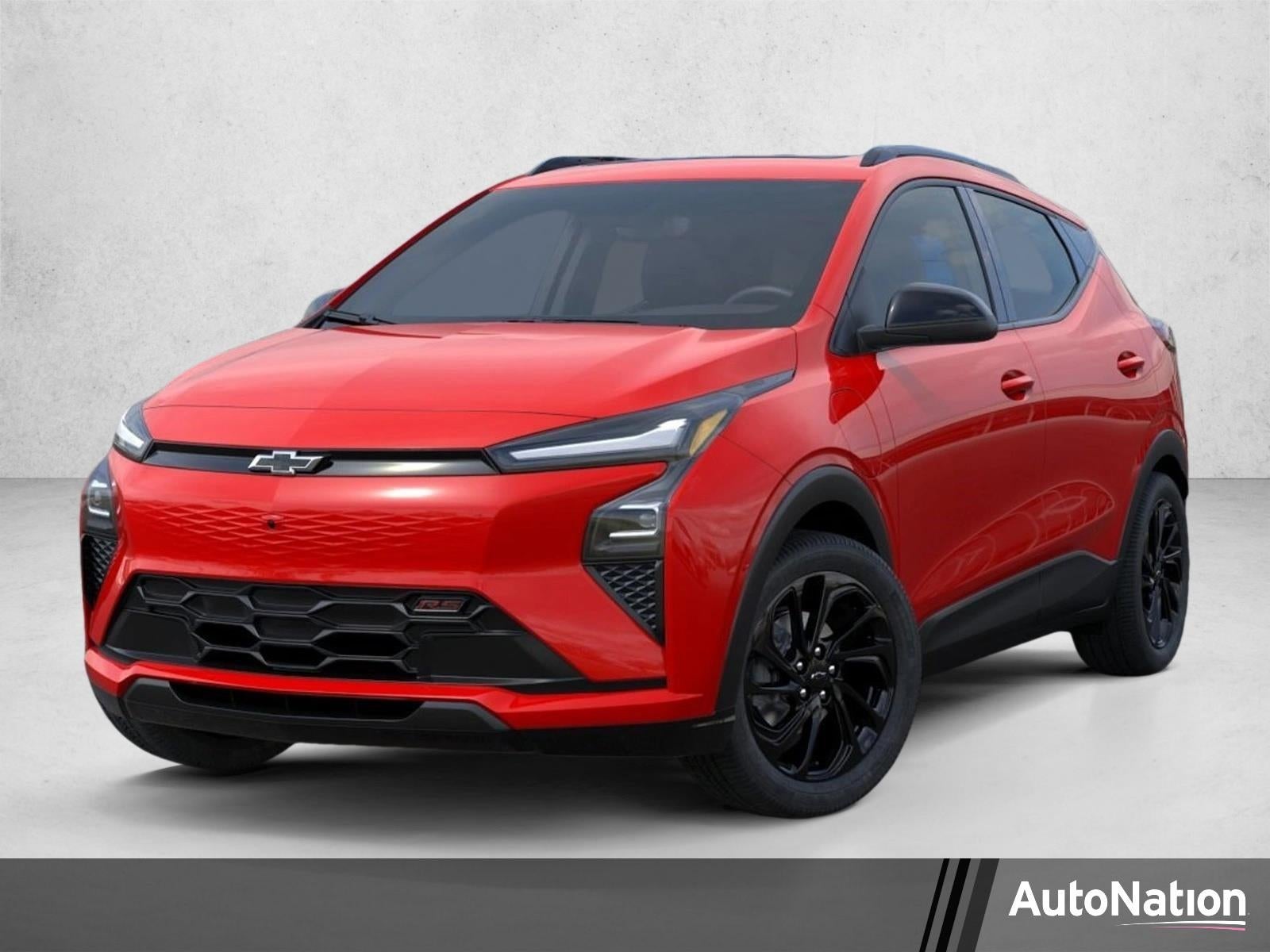 2027 Chevrolet Bolt RS in Habanero Orange — front three-quarter view