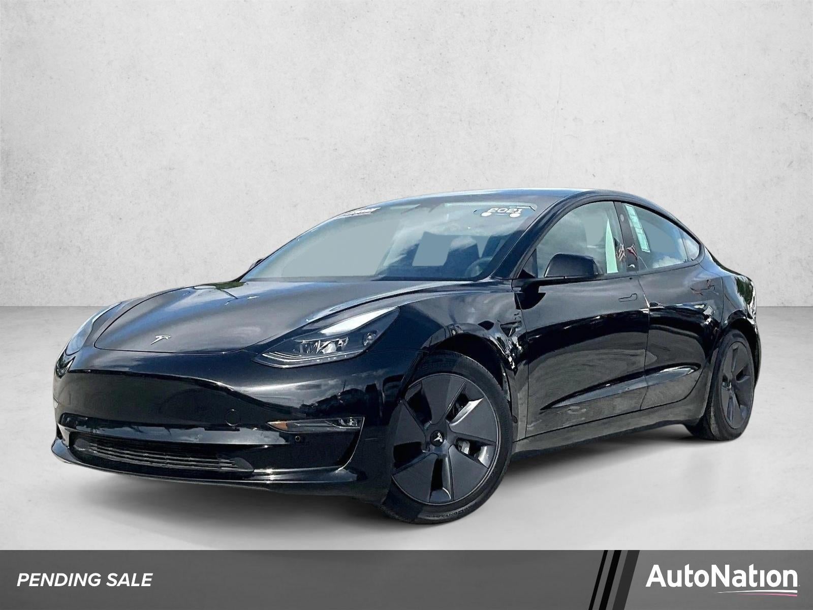 2021 Tesla Model 3 Long Range in Black — front three-quarter view