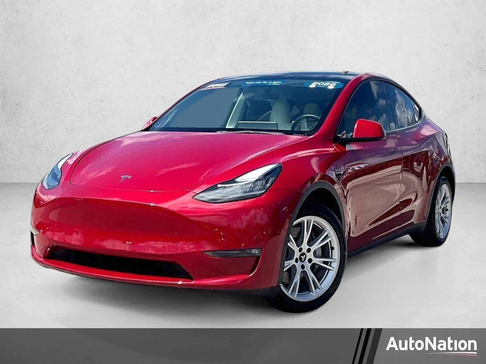 2022 Tesla Model Y Long Range Dual Motor All-Wheel Drive in Red — front three-quarter view