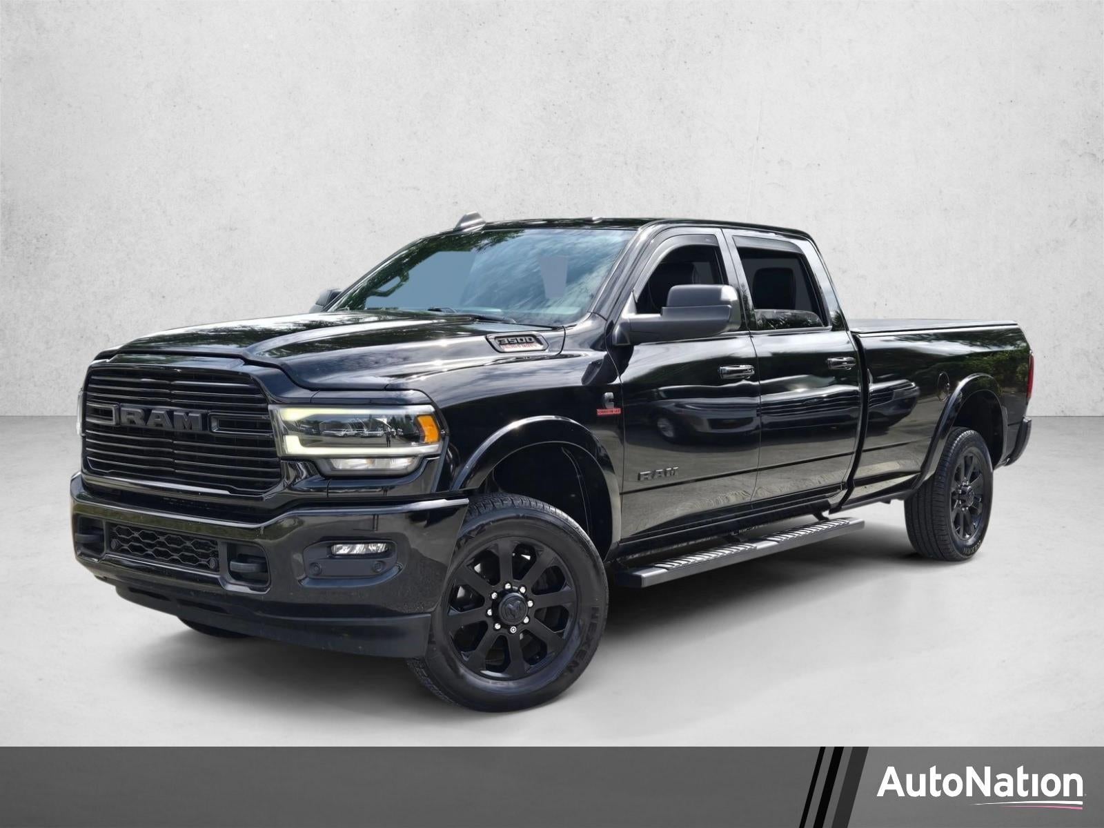 2022 RAM 3500 Laramie 4x4 Crew Cab 8' Box in Diamond Black Crystal Pearlcoat — front three-quarter view
