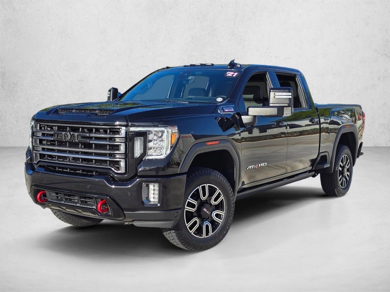 2021 GMC Sierra 2500 HD Crew Cab Standard Box 4-Wheel Drive AT4 in Ebony Twilight Metallic — front three-quarter view